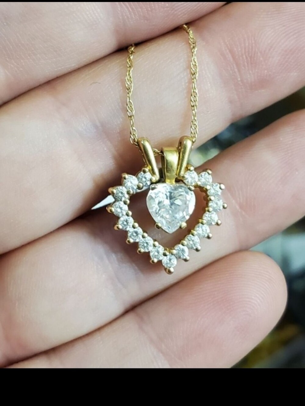 14k yellow gold double heart necklace. There's actually 2 separate pendants you
